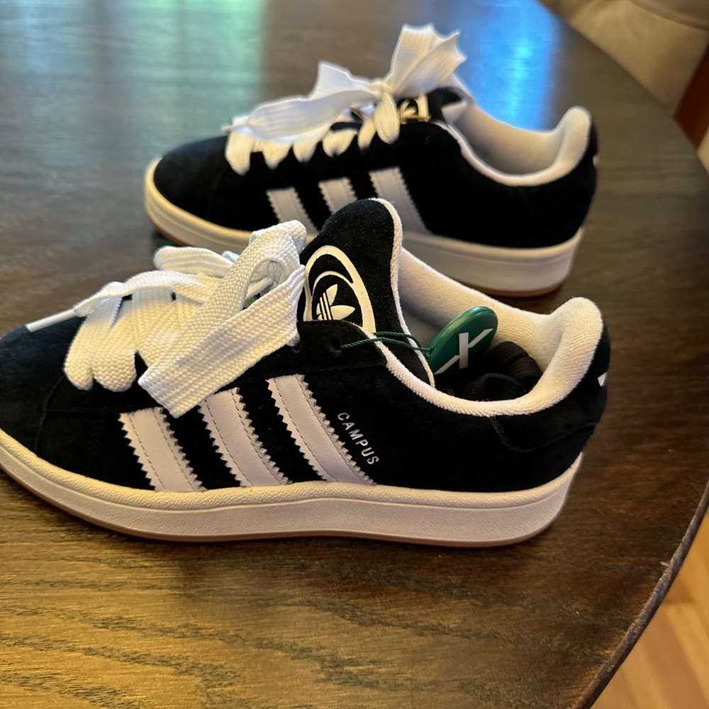 Brand new Adidas Campus tennis shoes.